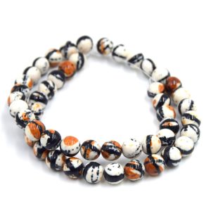 Perles de jade beige taché Ø8mm
